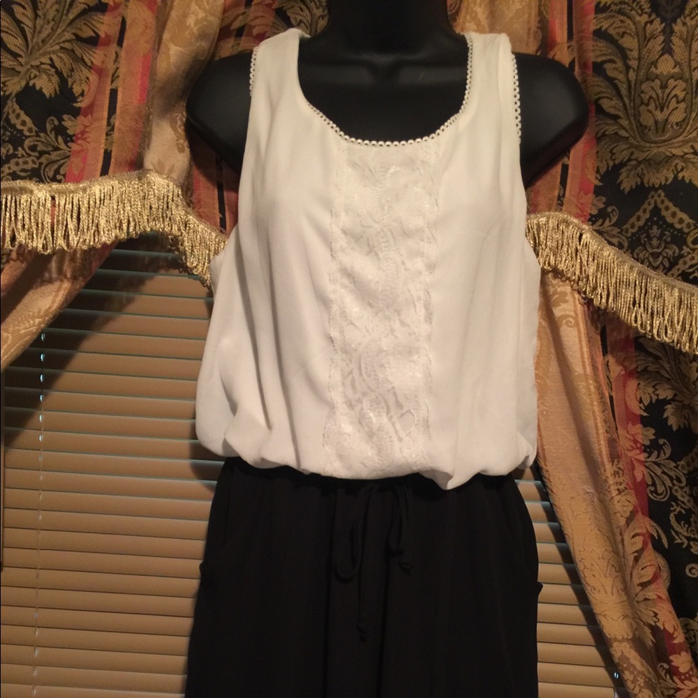 One piece new black and white jumpsuit. Large.
